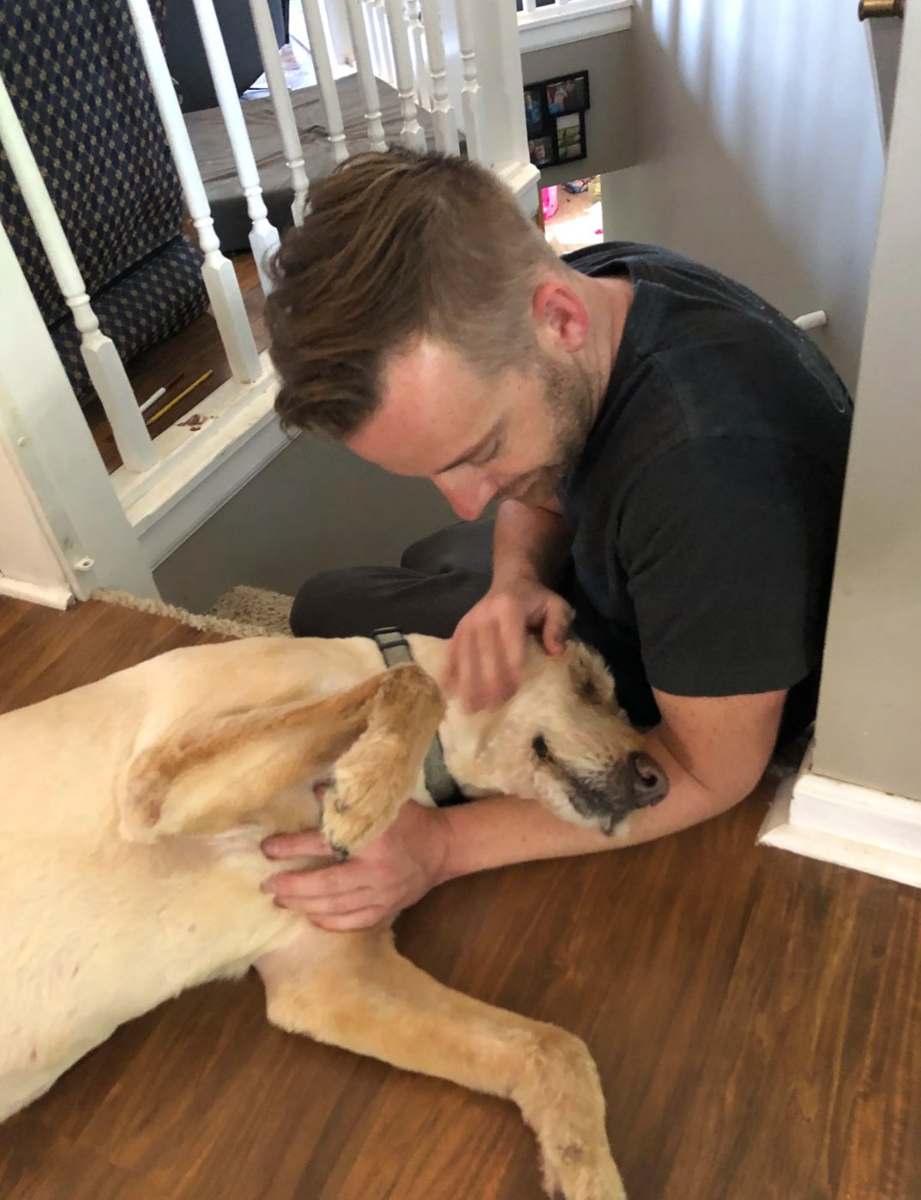 Trevor Crotts with his dog